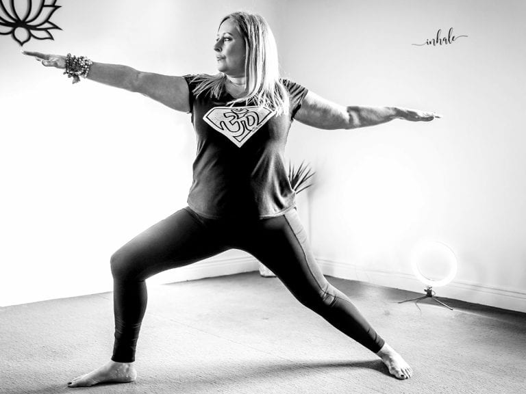 Yoga instructor doing warrior pose