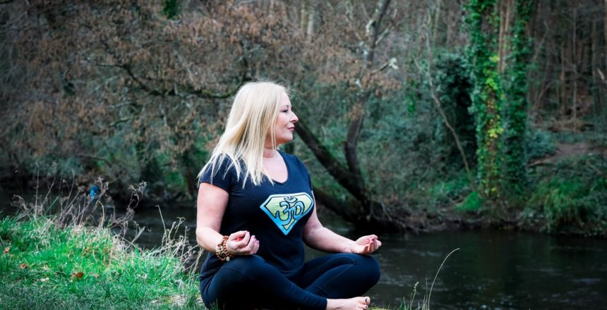 Anna Teague yoga pose by the river, image 2